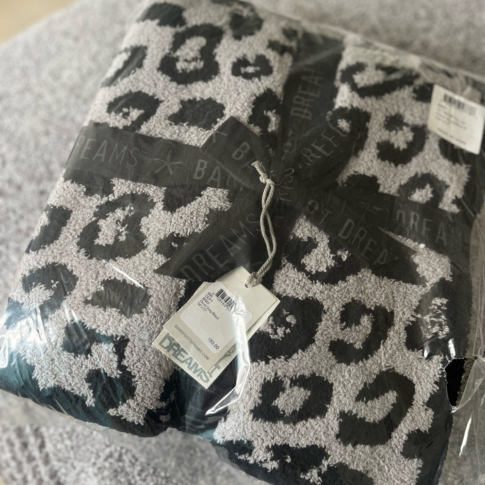 Barefoot Dreams famous “Barefoot In The Wild” throw. Brand new with tags!